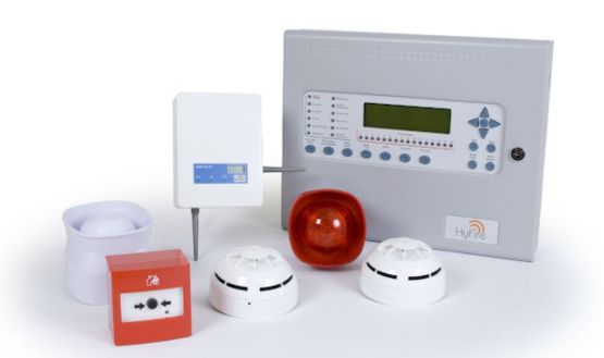 Comprehensive fire alarm system kit laid out before installation